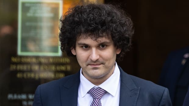 Sam Bankman-Fried, co-founder of FTX Cryptocurrency Derivatives Exchange, leaves court in New York, US, on Wednesday, July 26, 2023. Bankman-Fried faces a total of 13 counts ranging from conspiracy to commit wire fraud to conspiracy to violate the anti-bribery provisions of the Foreign Corrupt Practices Act, and faces more than 155 years in prison if convicted of all of them - although any sentence is likely to be much lower if he is found guilty. Photographer: Yuki Iwamura/Bloomberg via Getty Images
