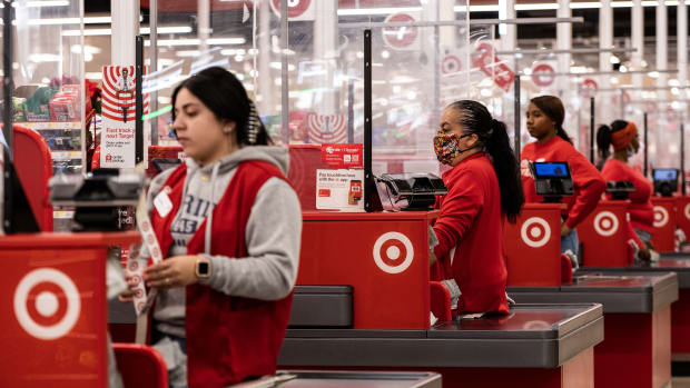 Cashier workers at a Target store on Black Friday in Chicago on Nov. 25, 2022. Photographer: Christopher Dilts/Bloomberg via Getty Images