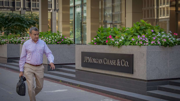 MANHATTAN, NEW YORK, UNITED STATES - 2023/09/14: A person seen walking by the marquee at the main entrance to JPMorgan Chase headquarters building in Manhattan. (Photo by Erik McGregor/LightRocket via Getty Images)