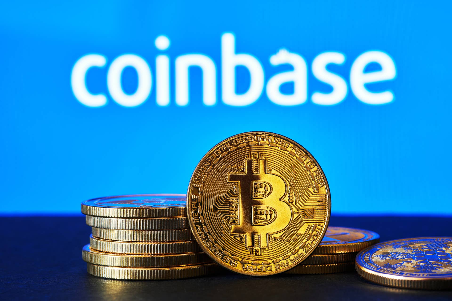 coinbase-logo-on-a-computer-screen-with-a-stack-of-2023-11-27-04-50-02-utc