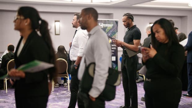 Job seekers attend a Diversity Career Group job fair in Los Angeles, California, US, on Thursday, April 17, 2025. Applications for US unemployment benefits fell to the lowest level in two months, consistent with a stable labor market. Photographer: Eric Thayer/Bloomberg via Getty Images