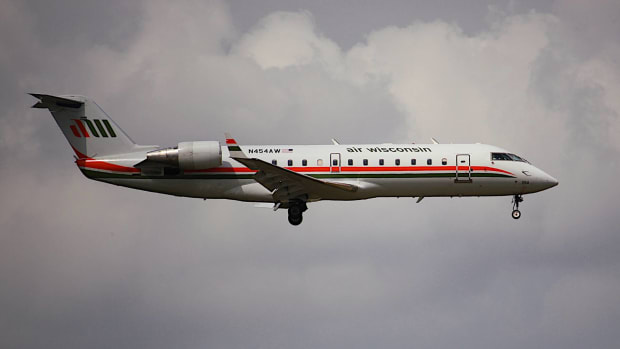 An Air Wisconsin aircraft in flight. lead.