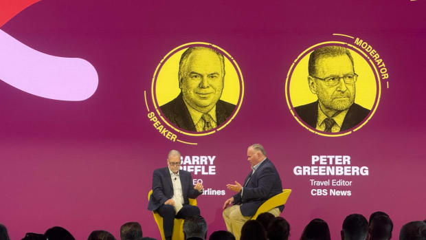 Frontier CEO Barry Biffle on stage. lead.