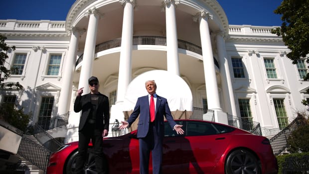 U.S. President Donald Trump and White House Senior Advisor, Tesla and SpaceX CEO Elon Musk deliver remarks next to a Tesla Model S on the South Lawn of the White House on March 11, 2025 in Washington, DC. Trump spoke out against calls for a boycott of Elon Musk’s companies and said he would purchase a Tesla vehicle in what he calls a ‘show of confidence and support’ for Elon Musk.