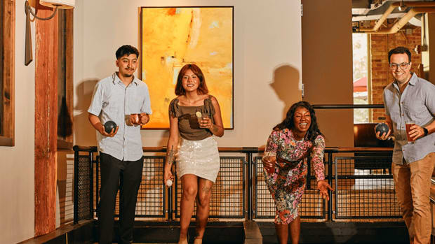 People play bocce at a Pinstripes location. lead.