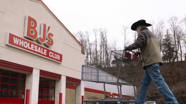 A shopper pushes a cart outside a BJ's Wholesale Club location in Rotterdam, New York, US, on Monday, March 4, 2024. BJ's Wholesale Club Holdings Inc. is scheduled to release earnings figures on March 7. Photographer: Angus Mordant/Bloomberg via Getty Images