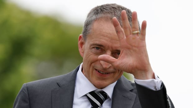 Pat Gelsinger, CEO of US multinational corporation and technology company Intel, waves to journalists after the signing of an agreement between the German government and Intel at the Chancellery in Berlin on June 19, 2023.