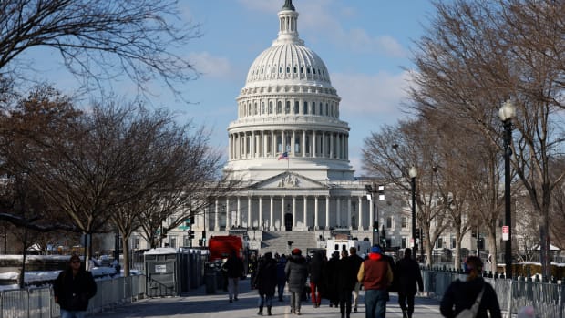 Members of the public arrive to view the flag-draped casket of former President Jimmy Carter lying in state in the US Capitol Rotunda in Washington, DC on January 8, 2025. Carter, the 39,th President of the United States, died at the age of 100 on December 29, 2024 at his home in Plains, Georgia. (Photo by Ting Shen / AFP) (Photo by TING SHEN/AFP via Getty Images)