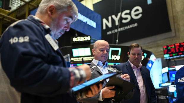 Traders work on the floor of the New York Stock Exchange (NYSE) at the opening bell in New York City on February 12, 2025. (Photo by ANGELA WEISS / AFP) (Photo by ANGELA WEISS/AFP via Getty Images)          