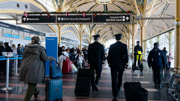 Pilots at Ronald Reagan National Airport (DCA) in Arlington, Virginia, US, on Tuesday, Jan. 7, 2025. A winter storm grounded flights across the eastern and central US on Monday, shutting federal offices in Washington and knocking out power across six states. Photographer: Al Drago/Bloomberg via Getty Images
