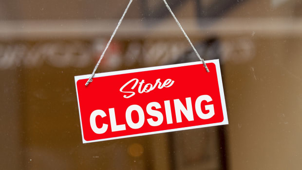 A sign says "store closing." Lead.