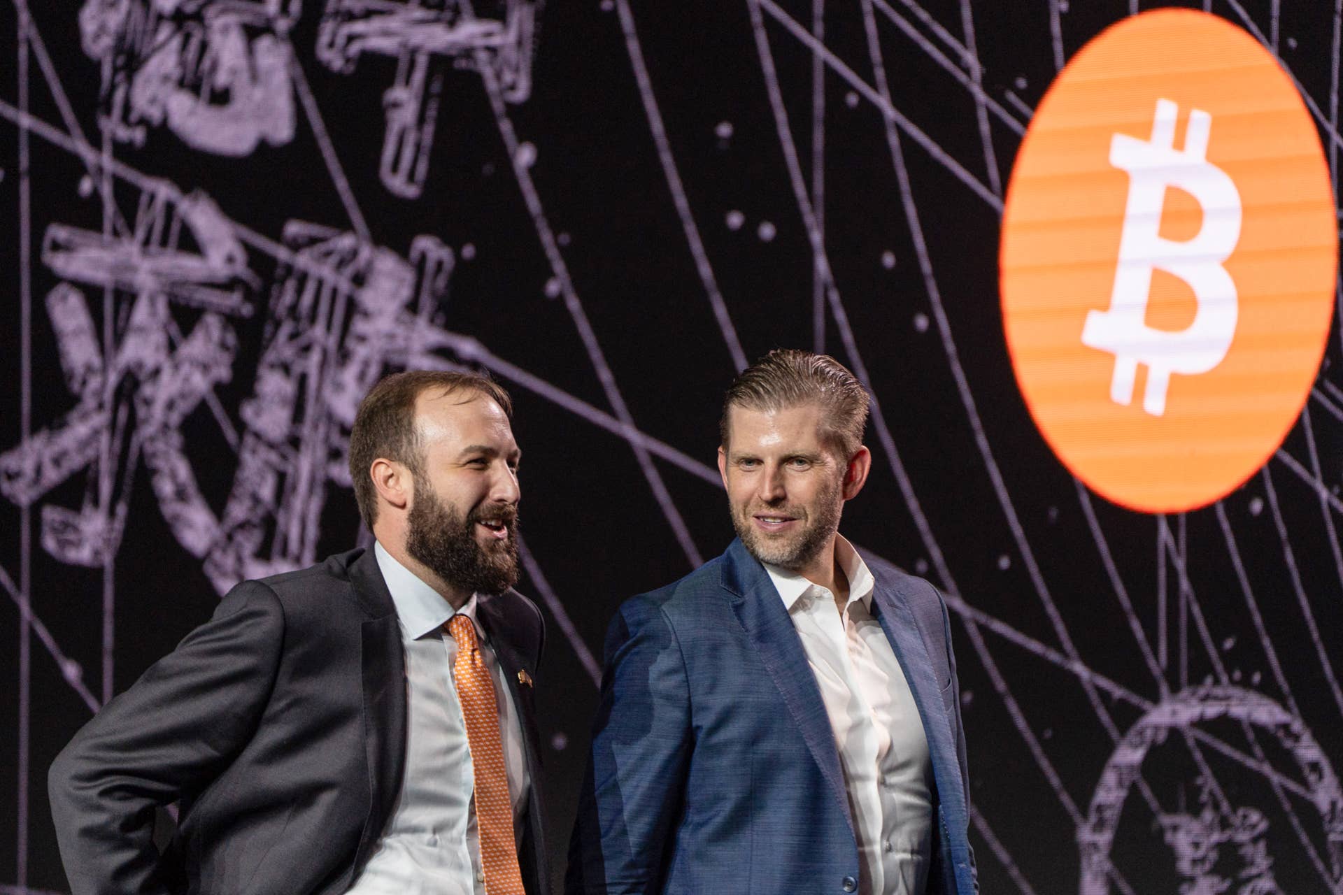 David Bailey (L), CEO of BTC Inc, and Eric Trump
