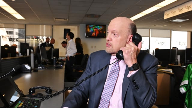 TV personality and finance author Jim Cramer speaks on the telephone.