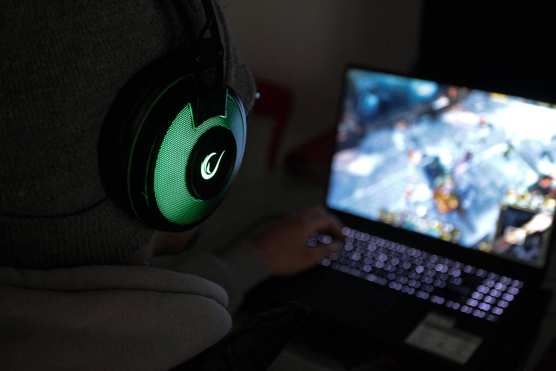 A young player in a dimly lit bedroom in Tunis, Tunisia, January 21, 2026.