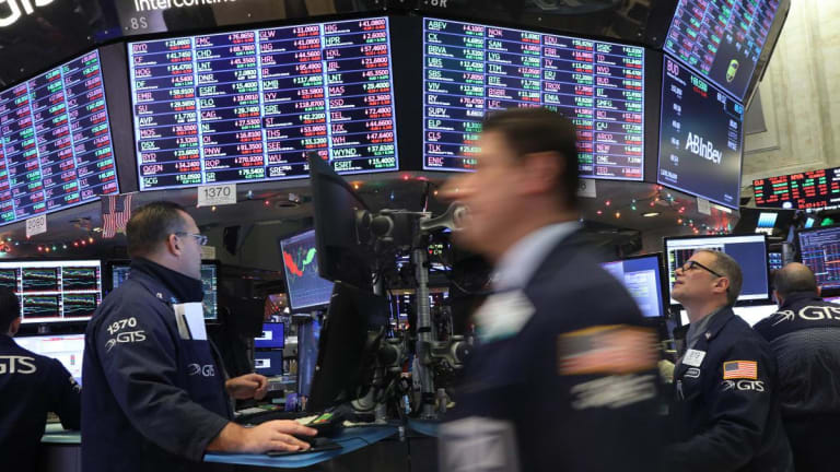 Stocks Mixed Ahead of Fed Decision; FedEx Profit Warning Clouds Sentiment