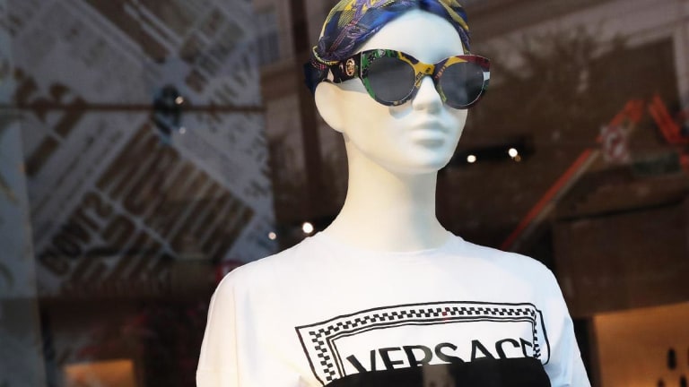 Capri Tumbles as Luxury Goods Maker Says Versace Spend Will Trim Q1 Earnings