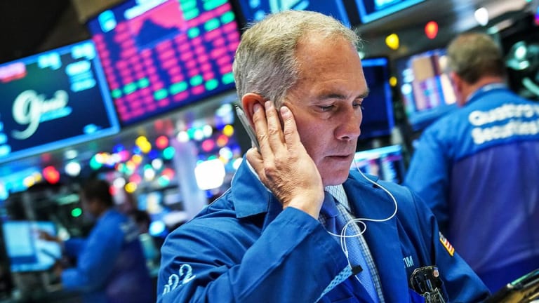 Dow Ends Solidly Higher as Investors Shrug Off Fed Warning of Slowing Growth