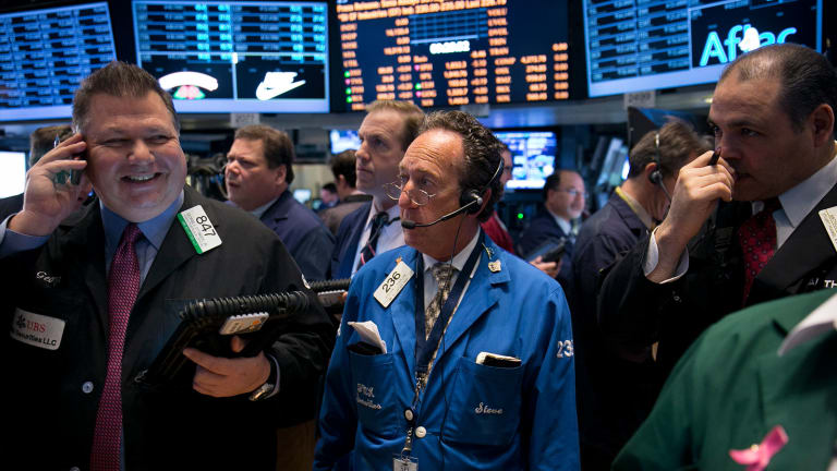 Dow, Nasdaq Hit Record Closes, S&P Slips