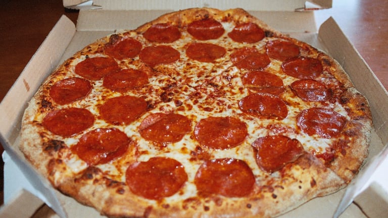 Domino's Pizza (DPZ) Stock Advances, Nomura Remains Optimistic