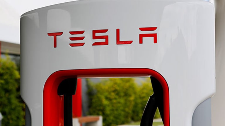 Tesla (TSLA) Stock Gains as Lines Form for Model 3