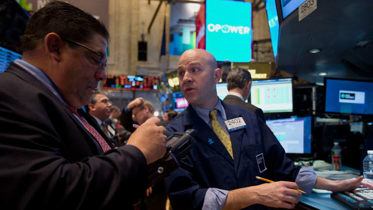 Stocks Crawl Into the Weekend as More Earnings Loom