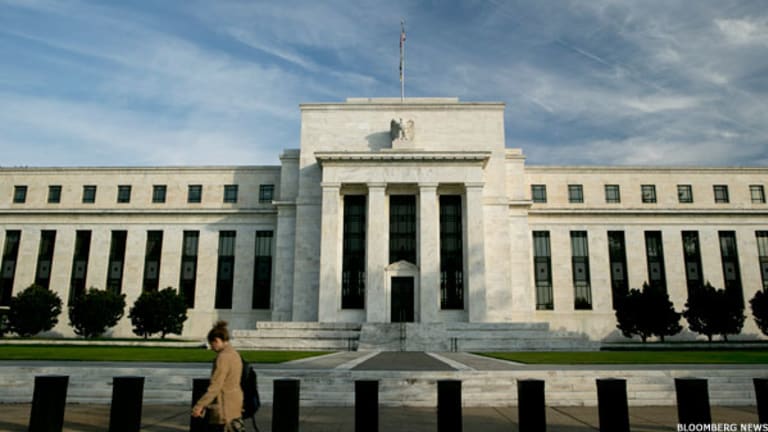 Fed May Be Ending Bond Buying, but Not Deficit Reduction