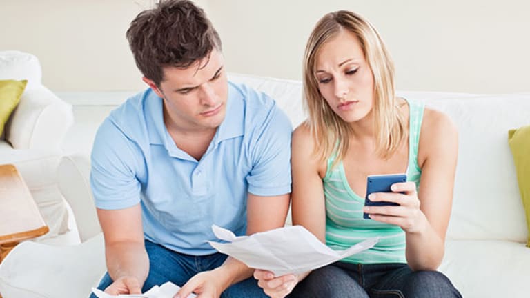 5 Questions to Ask Before You Help a Family Member Financially - TheStreet