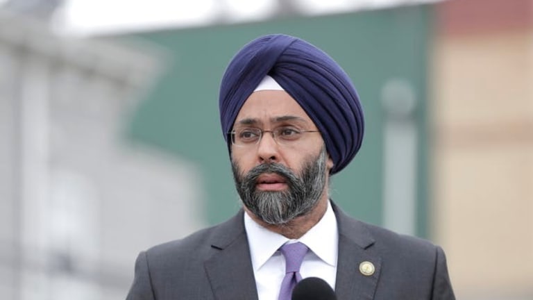 Who are the Sikhs and what are their beliefs?