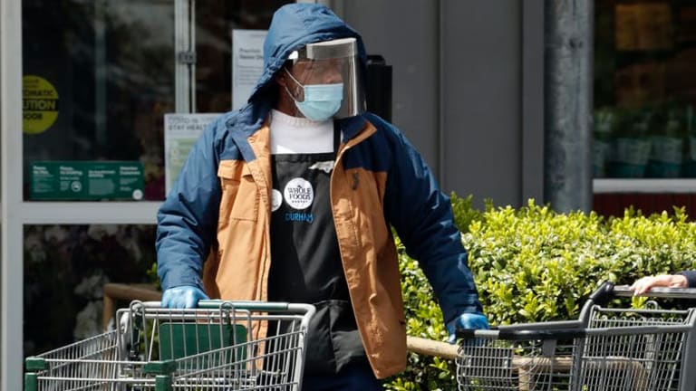 What is hazard pay, and why are Amazon and other companies ending it for essential workers?