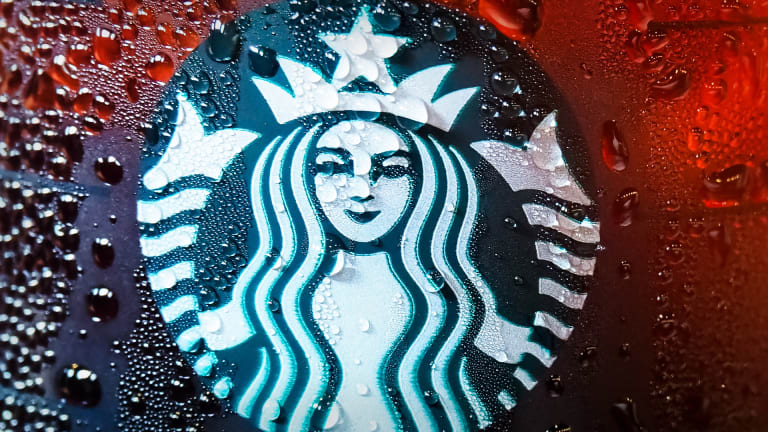 Starbucks upgraded to Buy from Hold at Stifel
