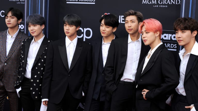 Three Members of K-Pop Band BTS Sell $8.4M of Stock in Management Firm