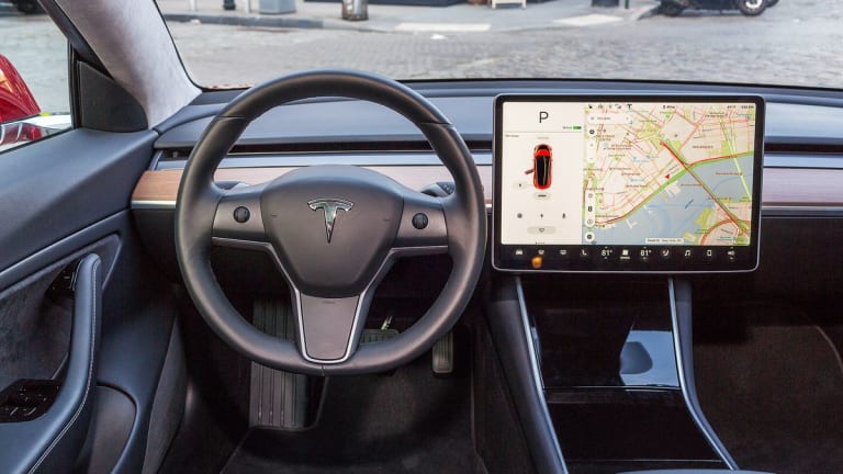 Tesla Software Defies Critics