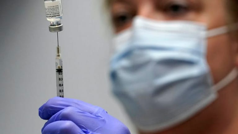 FDA panel recommends limiting Pfizer booster shots to Americans 65 and older, and those at high risk of severe COVID-19