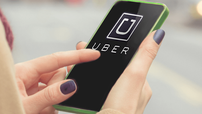 SoftBank, Toyota Looking to Invest in Uber's Self-Driving Unit