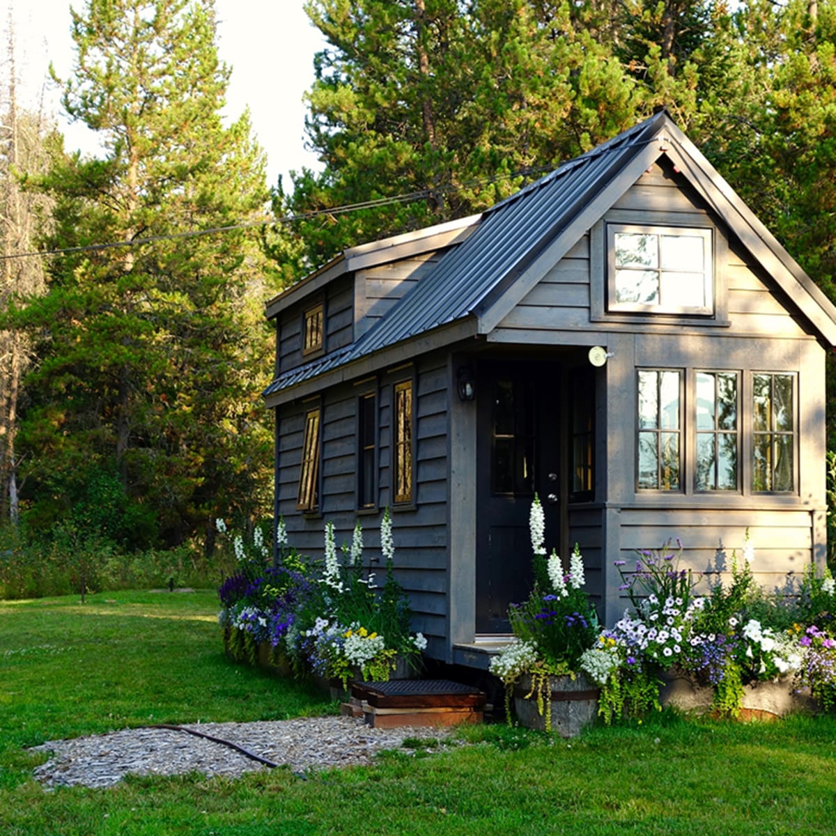 Inside a Tiny House With a Pop-Out Deck - Alpha Tiny Home by New