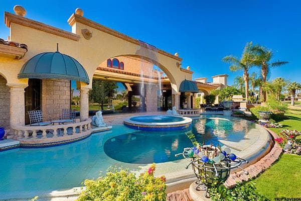 Location:Palm Desert, Calif.Weekly rate:&nbsp;$39,760Don't listen to TLC's advice from the '90s: by all means, chase waterfalls.This particular property, located on the 18th hole of the Desert Springs Golf Course features a resort-style pool with waterfalls and fountains and poolside outdoor private areas for lounging and dining. It's Old-World Tuscan villa meets new money, as an interior clad in marble, laden with art and covered in vaulted ceilings invites visitors to stay for a corporate retreat or golf outing.With seven bedrooms all featuring their own bathrooms, there's enough privacy to make large parties feel comfortable. With four golf courses within ten&nbsp;miles of the property; however, it's like living in a golf resort -- without the random drunks crowding the clubhouse bar after you finish up the back nine.