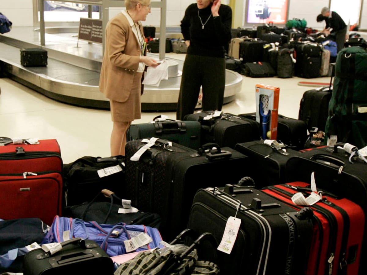 Rows of lost luggage line Tampa airport: 'Each bag represents a person'