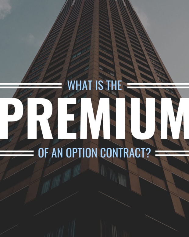 Darkened photo of a tall corporate/office building from below with text overlay that reads "What Is the Premium of an Option Contract?"