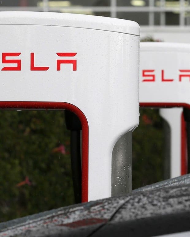 Tesla charging stations are shown outside of the Tesla factory in Fremont, Calif. Photo: AP