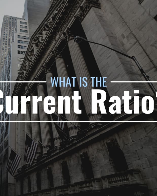Darkened image of Wall Street with text overlay that reads "What Is the Current Ratio?
