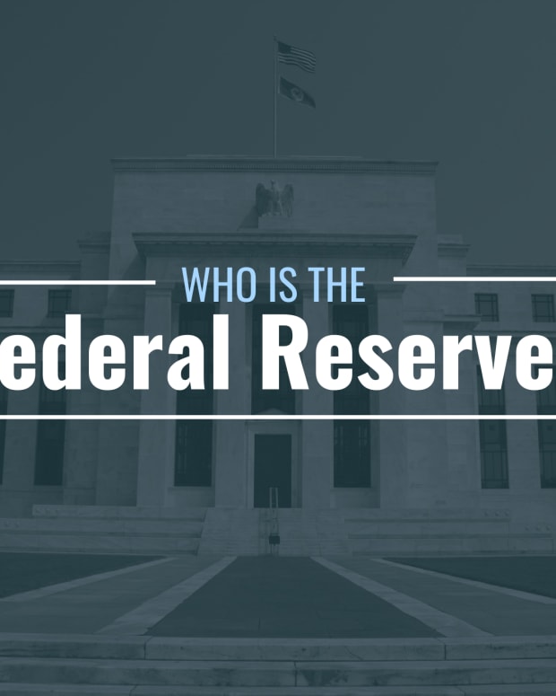 Exterior of the Federal Reserve headquarters with the text overlay "The Federal Reserve: Who They Are & What They Do For You"