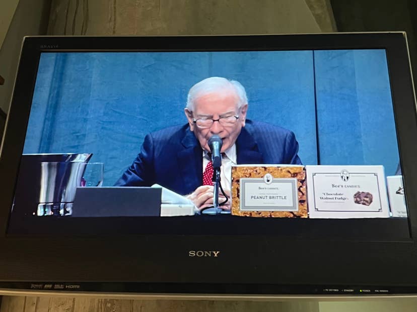 Warren Buffett seen on a screen outside Berkshire Hathaway's annual meeting. DBK