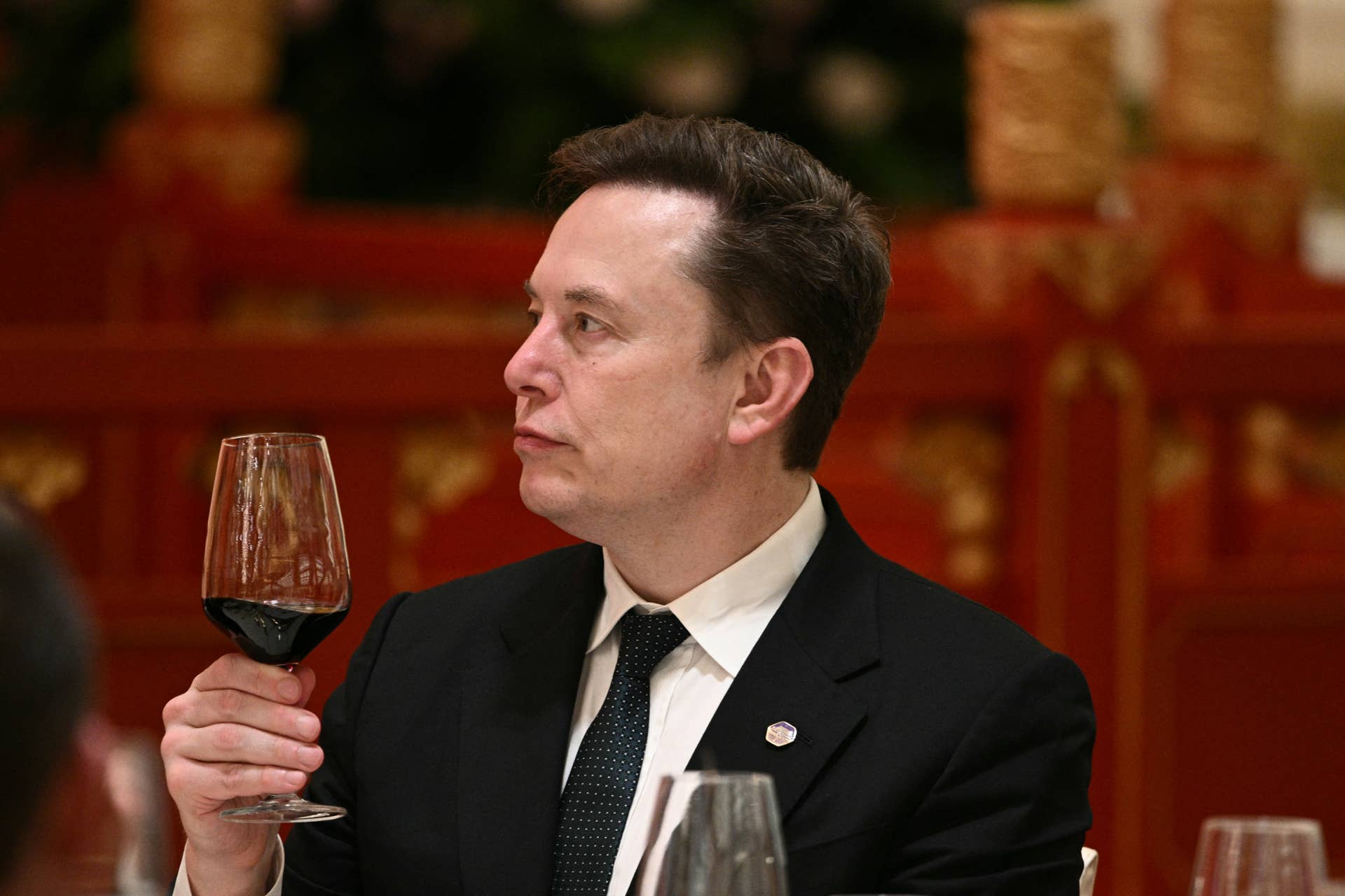 Tesla and SpaceX CEO Elon Musk attends a state banquet for US President Donald Trump and China's President Xi Jinping at the Great Hall of the People in Beijing on May 14, 2026.