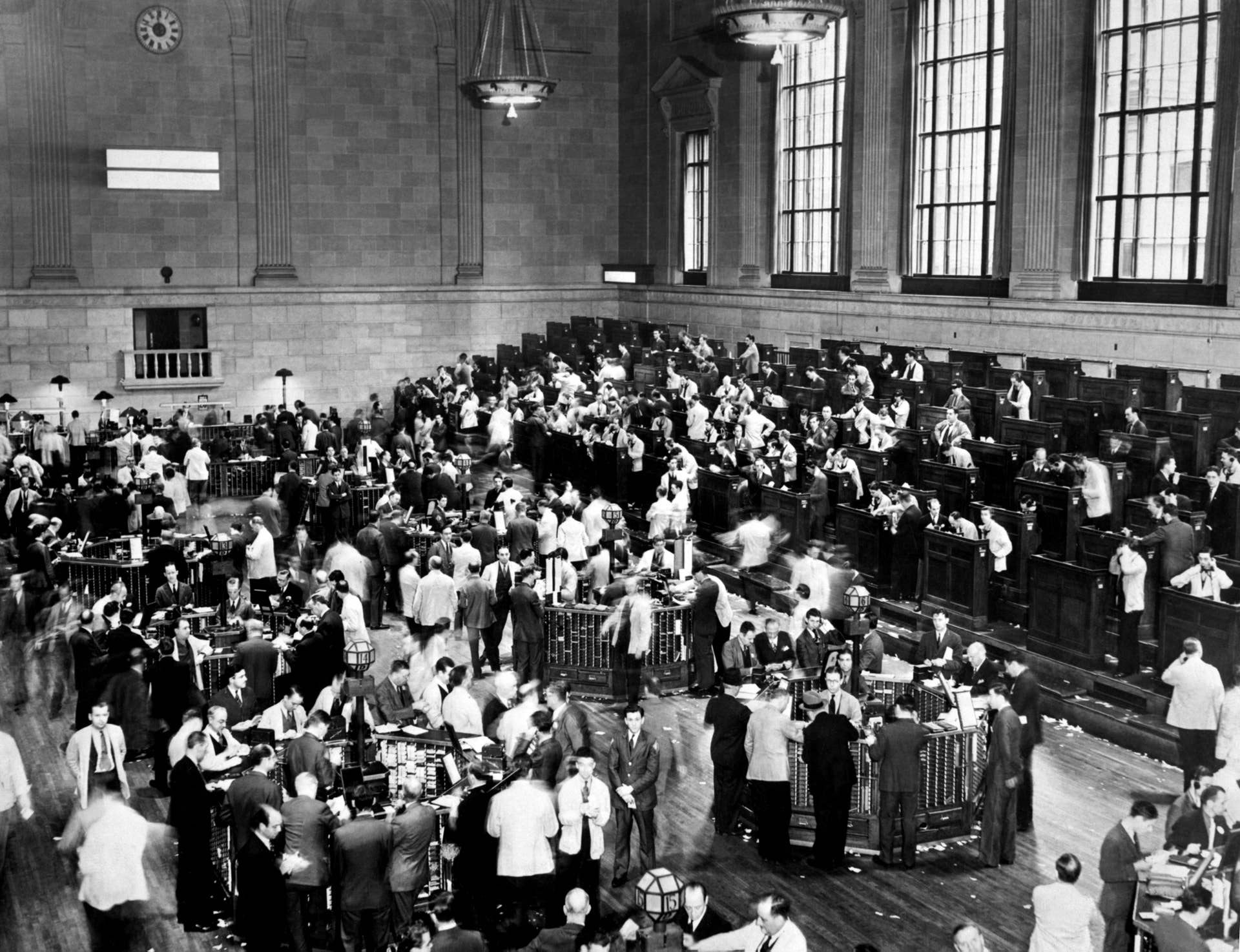 Traders rush, 1929, October in Wall Street as New York Stock Exchange crashed sparking a run on banks that spread across the country.