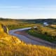 20. North DakotaCost of living ranking: 29Taxes ranking: 30Above, the Little Missouri River running through Theodore Roosevelt National Park.Photo: Shutterstock
