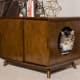 Boomer &amp; George Carter Mid-Century Modern Cat Litter Box$219.99 at HayneedleYour cat's litter box doesn't need to be gauche. This chic and discreet mid-century modern cat box goes with your on-trend decor. It has two sliding doors for easy access and a hole for the cat.Photo: Hayneedle