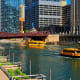 9. ChicagoTop performerPrivate cars: 81%Public transport options: Train, bus, metro, taxi, ferryMonthly public transport pass: $101Chicago's Complete Streets initiative aims to make city streets equally accessible to pedestrians, transit users, and cyclists. Above, water taxis on the Chicago River.Photo: Shelly Bychowski Shots / Shutterstock