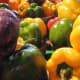 Sweet bell peppers of all sizes and colors are among the “dirty dozen” fruits and vegetables, which the Environmental Working Group suggests consumers should forego for their organic versions. More than 81% of tested bell peppers were positive for pesticides, according to government research. Photo Credit: sfllaw