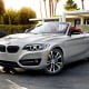 Starting price: $38,650Miles per gallon: 23 city, 34 highway, 28.5 mpgThe 2 Series may be the entry-level 3 Series's less-fortunate sibling, but it's still a Bimmer.With a bit more plastic in the interior, a bit more petrochemical upholstery on the sheets and just a 2.0-liter 4-cylinder, 240-horsepower turbo engine under the hood, it's basically a baby step above the company's Mini badge. However, with its sport setting, stability control and performance suspension, this soft-top bargain BMW wants to give you all the fun of driving this brand at the cost of some of its more luxurious components. You still get the iDrive touchscreen computer system, rain-sensing wipers, automatic climate control and keyless ignition, but the satellite radio is extra, leather and wood are nonexistent and the more high-tech safety features are noticeably absent. Meanwhile, you're in a BMW convertible for less than $40,000.