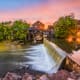 The name Pigeon Forge comes from the passenger pigeons which used to fly into the valley, and from the bloomery forge built by Isaac Love in 1817. Make no mistake, this is a tourist town. Pictured is the old mill in Pigeon Forge.